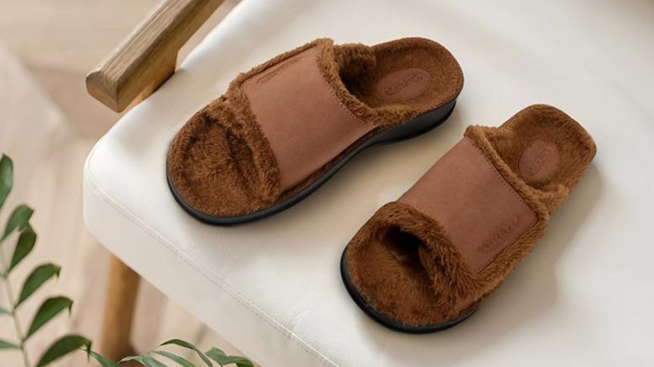 Warm Fuzzy Slippers pair on a chair