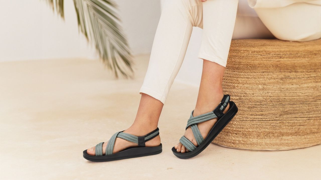 womens feet closeup shot with slingback sandals