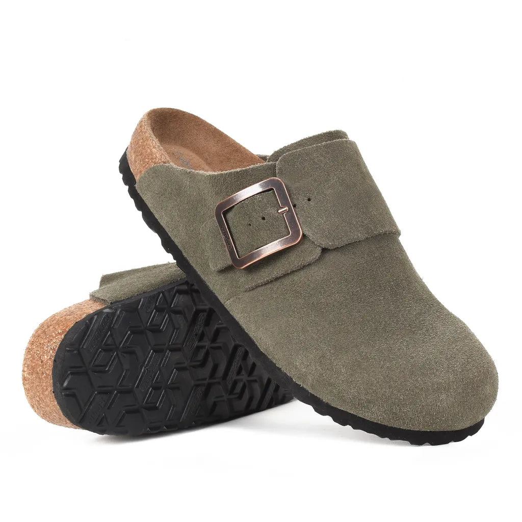 Pair of green suede clogs with a buckle
suede clogs
ladies suede clogs​