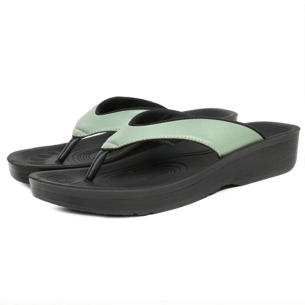 Pair of green and black sandals 
orthopedic sandals