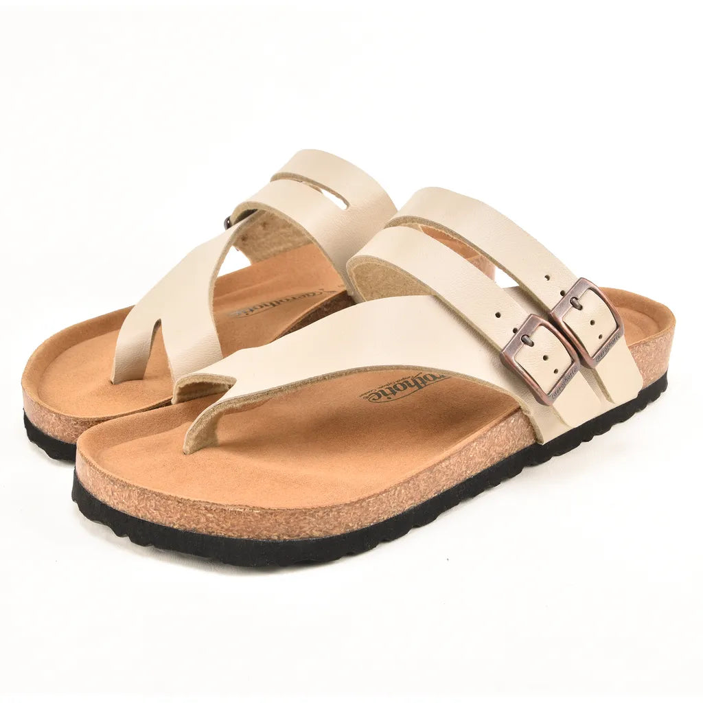 Pair of beige sandals with a buckle 
cork sandals
cork sandals womens
cork bed sandals women