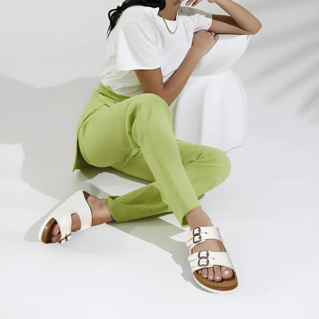 Person wearing white sandals 
womens cork sandals
cork sandals
cork sandals womens